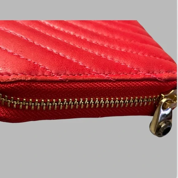 Henri Bendel red quilted wallet with a gold-tone logo. - Picture 5 of 16